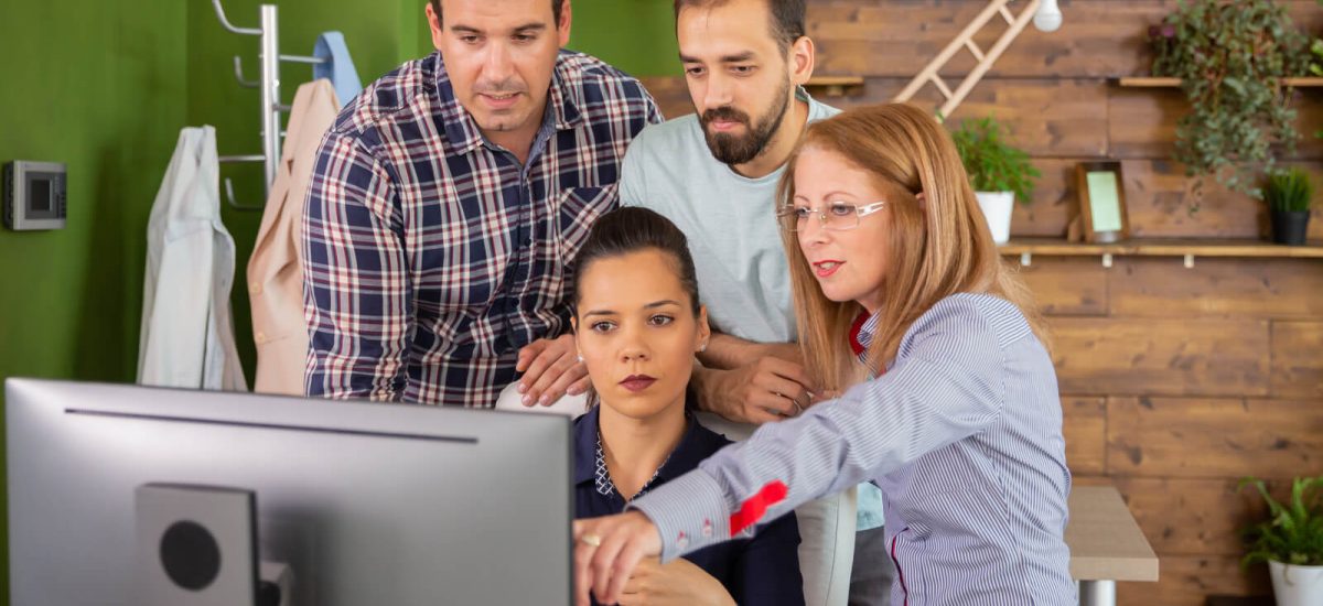 middle-age-female-manager-pointing-into-computer-m-2023-11-27-04-58-57-utc-1.jpg